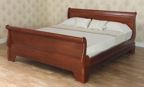A mahogany French Versailles Sleigh Bed with regular footboard