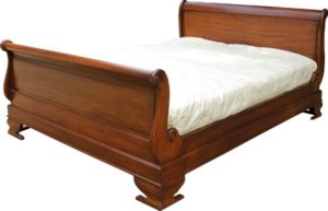 Sleigh bed with wax finish